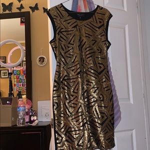 Never before worn black and gold dress